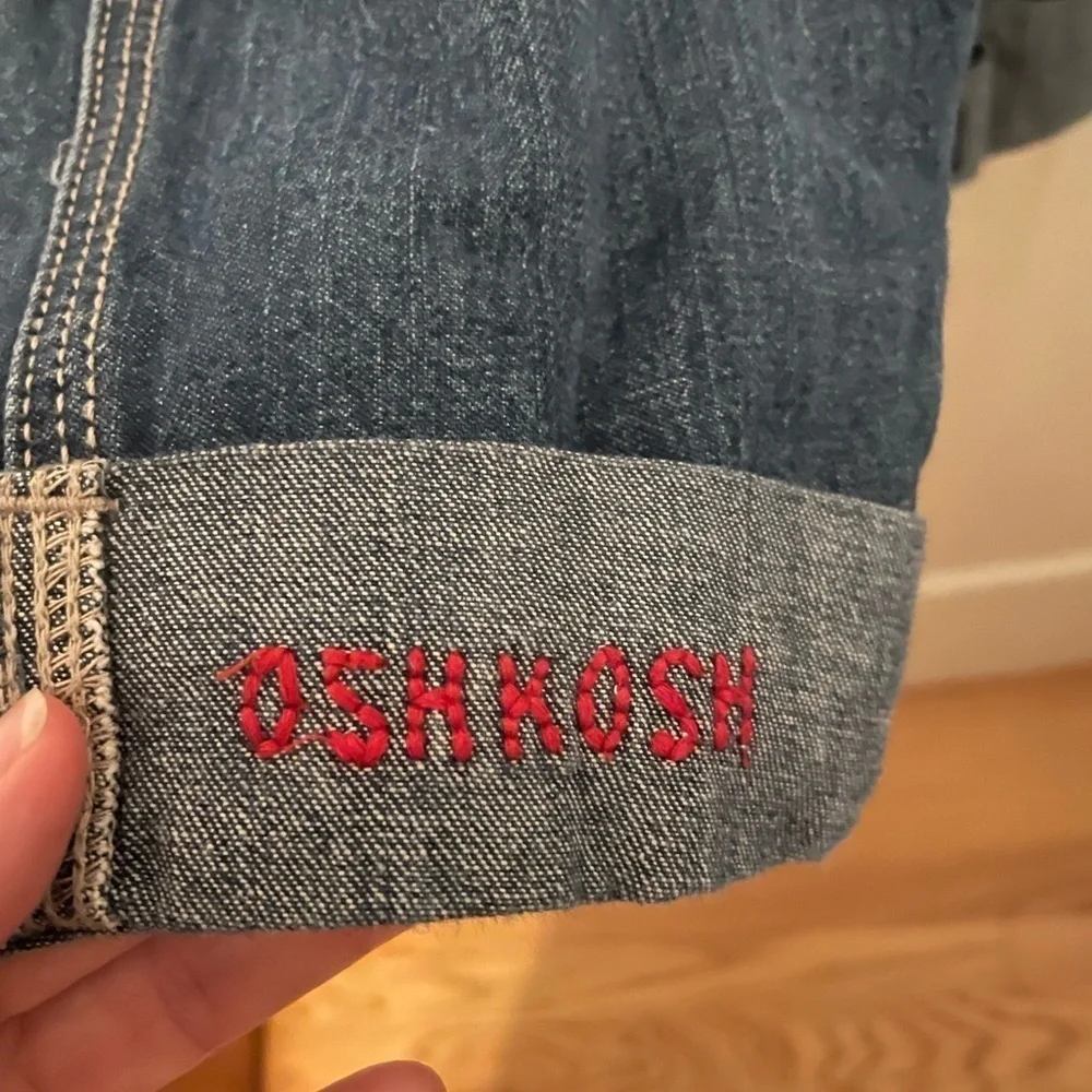 Osh Kosh Denim overalls with patches and spell out